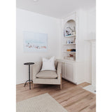 A piece we lovingly refer to as the "three legged-dog" to our clients, the Sullivan chair from Verellen is a beautiful statement piece from every angle. The 360 degree attention to detail makes it a striking piece in open concept spaces. This chair sits wonderfully for mounted televisions or with conversation and a glass of wine in the evening.  Select from Ash wood or Walnut legs.  33”w X 34”d x 28”/30”h