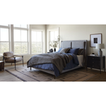Light, livable luxury. Upholstered in a grey synthetic-blend, a tapered headboard features fixed overscale pillows, for a calming look with great depth. Wire-brushed parawood legs lend a warm, natural finishing touch. Performance fabrics are specially created to withstand spills, stains, high traffic and wear, ensuring long-term comfort and unmatched durability. Amethyst Home provides interior design, new home construction design consulting, vintage area rugs, and lighting in the Kansas City metro area.