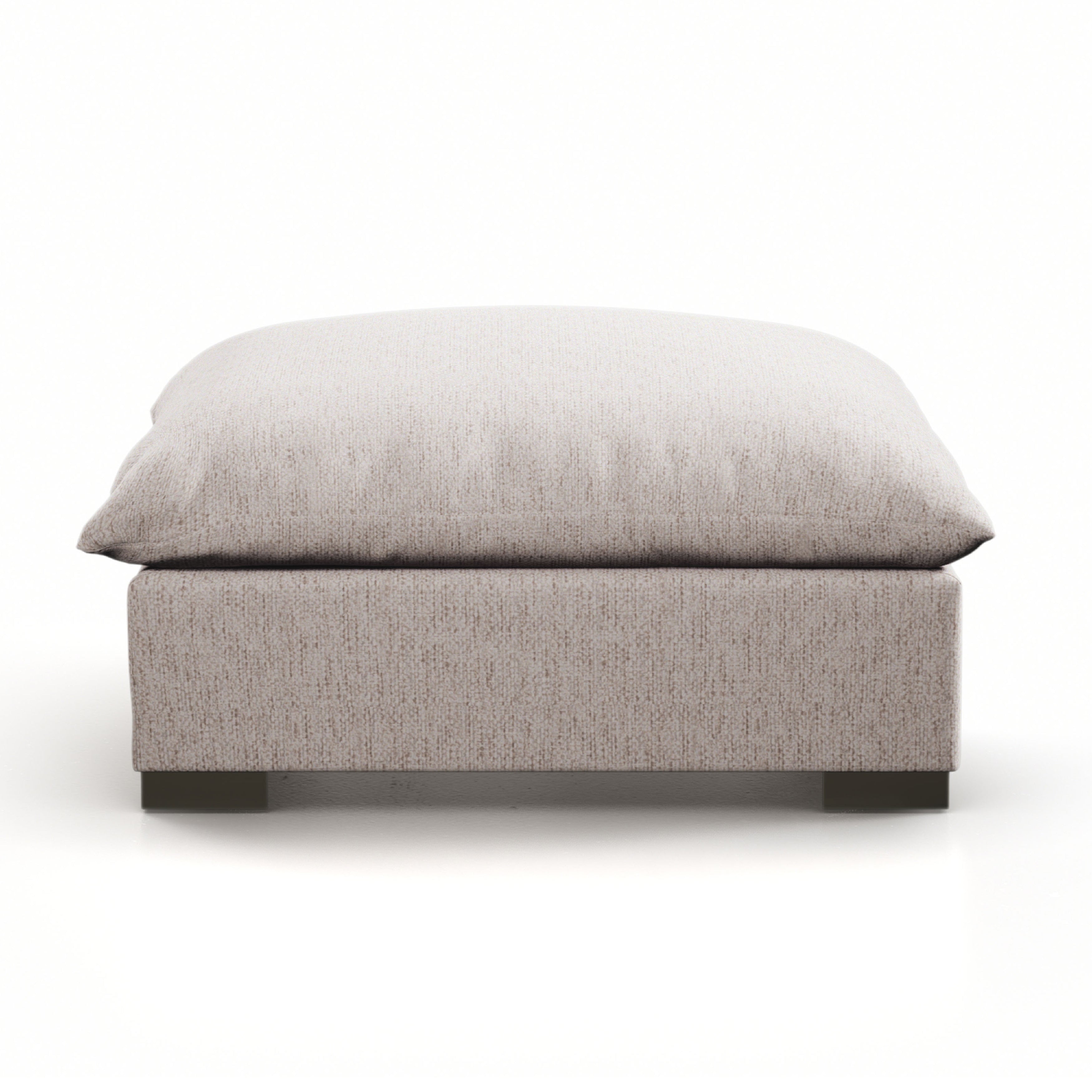 Meet the ultimate modular lounger. Knife edge cushioning is upholstered in a stone-colored high-performance fabric, perfect for modern living. Ottoman piece to matching sectional. Performance fabrics are specially created to withstand spills, stains, high traffic and wear, ensuring long-term comfort and unmatched durability. Amethyst Home provides interior design, new home construction design consulting, vintage area rugs, and lighting in the Tampa metro area.