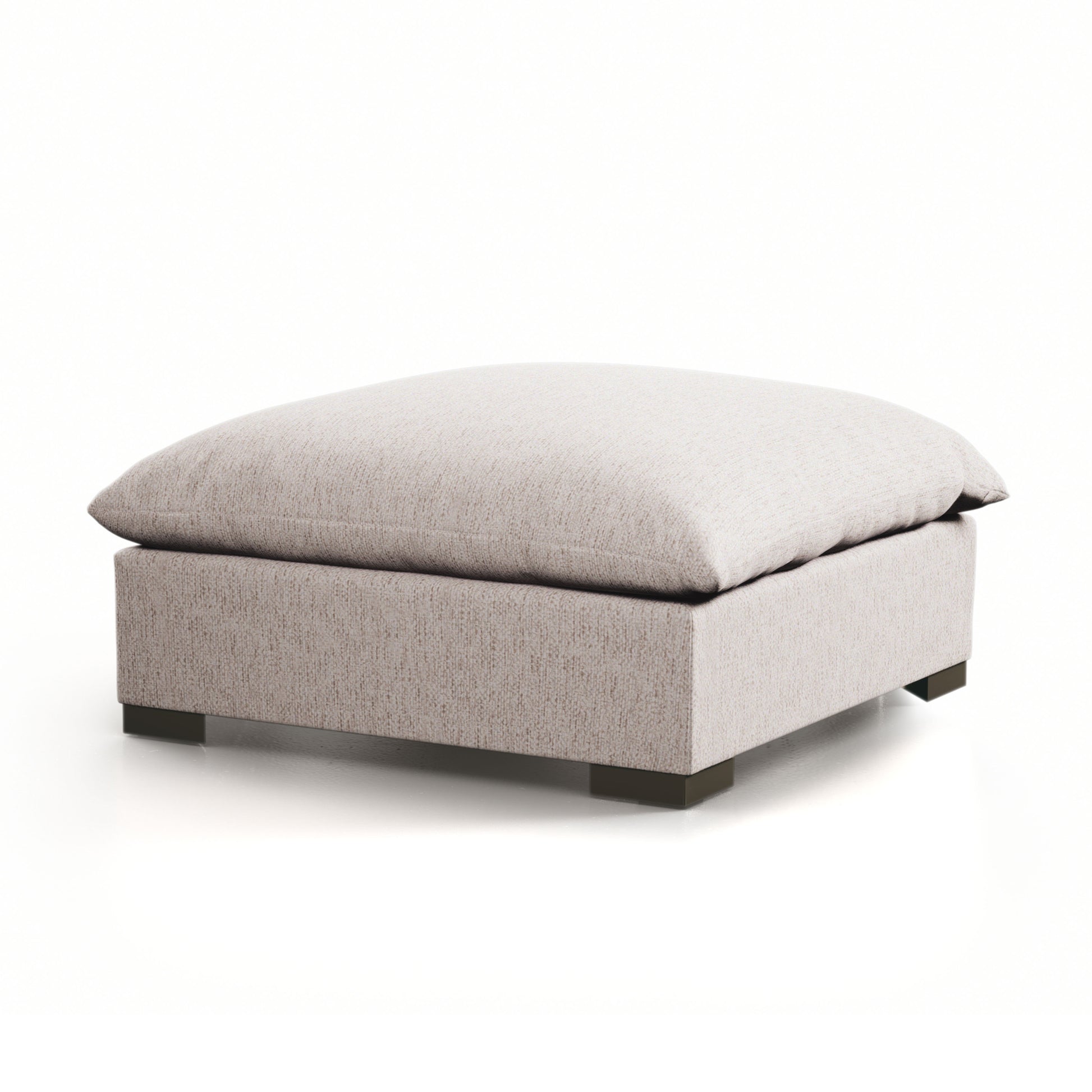 Meet the ultimate modular lounger. Knife edge cushioning is upholstered in a stone-colored high-performance fabric, perfect for modern living. Ottoman piece to matching sectional. Performance fabrics are specially created to withstand spills, stains, high traffic and wear, ensuring long-term comfort and unmatched durability. Amethyst Home provides interior design, new home construction design consulting, vintage area rugs, and lighting in the Alpharetta metro area.