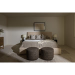 Modern, clean shaping meets inflated comfort with this padded, upholstered bed frame in a textural boucle-like pattern.  Text(251) 257-7986 for quick product details.Overall Dimensions: 92.25"W x 89.25"L x 48"H Amethyst Home provides interior design, new home construction design consulting, vintage area rugs, and lighting in the Omaha metro area.