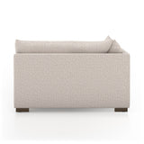 Featuring Westwood Sectional Pieces - Bayside Pebble by Four Hands at Amethyst Home. Meet the ultimate modular lounger. Knife edge cushioning is upholstered in a stone-colored high-performance fabric, perfect for modern living. Ottoman piece to matching sectional. Performance fabrics are specially created to withstand spills, stains, high traffic and wear,.  Amethyst Home provides interior design, new home construction design consulting, vintage area rugs, and lighting in the Park City metro area.
