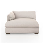 Featuring Westwood Sectional Pieces - Bayside Pebble by Four Hands at Amethyst Home. Meet the ultimate modular lounger. Knife edge cushioning is upholstered in a stone-colored high-performance fabric, perfect for modern living. Ottoman piece to matching sectional. Performance fabrics are specially created to withstand spills, stains, high traffic and wear, e.  Amethyst Home provides interior design, new home construction design consulting, vintage area rugs, and lighting in the Houston metro area.