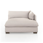 Featuring Westwood Sectional Pieces - Bayside Pebble by Four Hands at Amethyst Home. Meet the ultimate modular lounger. Knife edge cushioning is upholstered in a stone-colored high-performance fabric, perfect for modern living. Ottoman piece to matching sectional. Performance fabrics are specially created to withstand spills, stains, high traffic and wear,.  Amethyst Home provides interior design, new home construction design consulting, vintage area rugs, and lighting in the Nashville metro area.