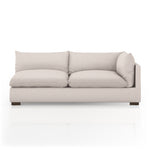 Featuring Westwood Sectional Pieces - Bayside Pebble by Four Hands at Amethyst Home. Meet the ultimate modular lounger. Knife edge cushioning is upholstered in a stone-colored high-performance fabric, perfect for modern living. Ottoman piece to matching sectional. Performance fabrics are specially created to withstand spills, stains, high traffic and wear, .  Amethyst Home provides interior design, new home construction design consulting, vintage area rugs, and lighting in the Monterey metro area.