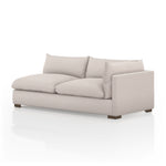 Featuring Westwood Sectional Pieces - Bayside Pebble by Four Hands at Amethyst Home. Meet the ultimate modular lounger. Knife edge cushioning is upholstered in a stone-colored high-performance fabric, perfect for modern living. Ottoman piece to matching sectional. Performance fabrics are specially created to withstand spills, stains, high traffic and wear, .  Amethyst Home provides interior design, new home construction design consulting, vintage area rugs, and lighting in the Monterey metro area.
