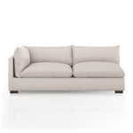 Featuring Westwood Sectional Pieces - Bayside Pebble by Four Hands at Amethyst Home. Meet the ultimate modular lounger. Knife edge cushioning is upholstered in a stone-colored high-performance fabric, perfect for modern living. Ottoman piece to matching sectional. Performance fabrics are specially created to withstand spills, stains, high traffic and w.  Amethyst Home provides interior design, new home construction design consulting, vintage area rugs, and lighting in the Newport Beach metro area.