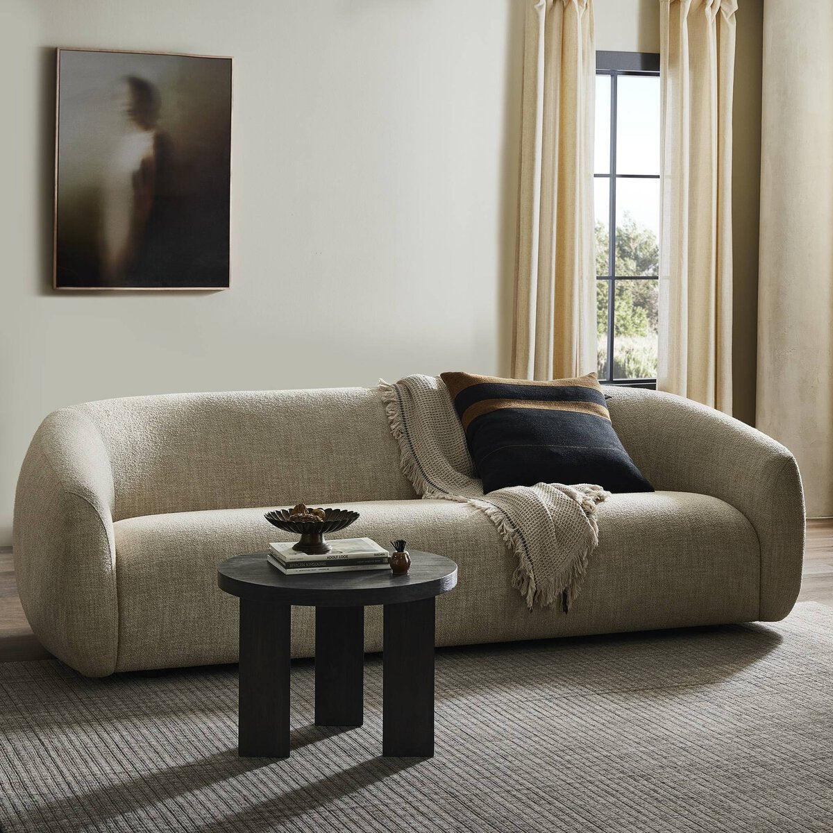 Featuring Channing Yuma Cream Sofa by Four Hands at Amethyst Home. This 100-inch Channing Yuma Cream sofa offers luxurious comfort and elegant style to any living space. With its high-quality construction and soft, neutral fabric, this sofa is the perfect addition to your home. Enjoy the benefits of expert craftsmanship and timeless design with this bea. Amethyst Home provides interior design, new home construction design consulting, vintage area rugs, and lighting in the Newport Beach metro area.
