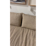 This Grant Armless Sofa - Heron Sand is a new twist to an Amethyst Favorite! With Italian high-performance fabric, inviting, boucle-like texture takes this modern lounging essential to the next level. Armless sofa to matching sectional. Amethyst Home provides interior design, new home construction design consulting, vintage area rugs, and lighting in the Tampa metro area.