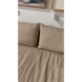 This Grant Armless Sofa - Heron Sand is a new twist to an Amethyst Favorite! With Italian high-performance fabric, inviting, boucle-like texture takes this modern lounging essential to the next level. Armless sofa to matching sectional. Amethyst Home provides interior design, new home construction design consulting, vintage area rugs, and lighting in the Tampa metro area.