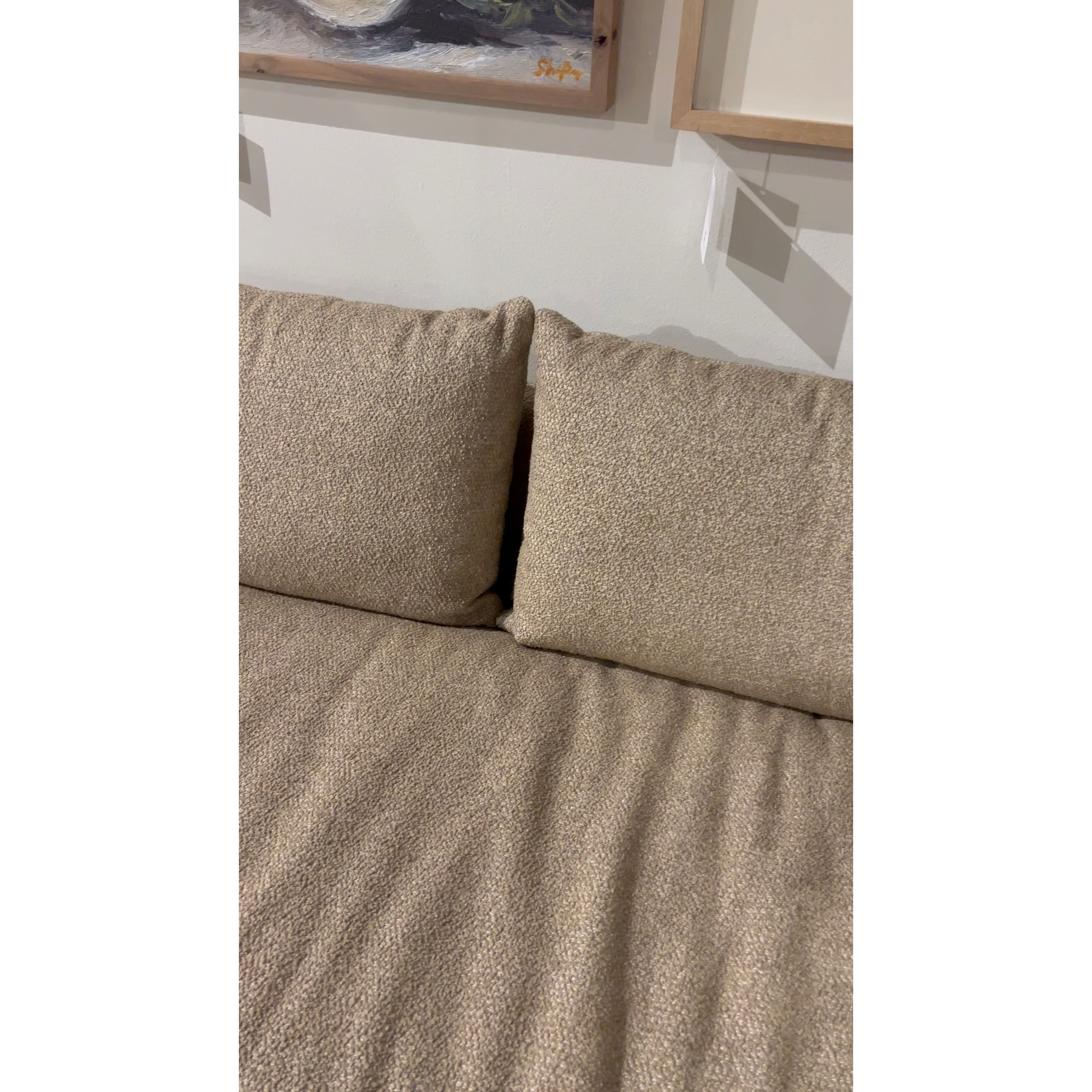 This Grant Armless Sofa - Heron Sand is a new twist to an Amethyst Favorite! With Italian high-performance fabric, inviting, boucle-like texture takes this modern lounging essential to the next level. Armless sofa to matching sectional. Amethyst Home provides interior design, new home construction design consulting, vintage area rugs, and lighting in the Tampa metro area.
