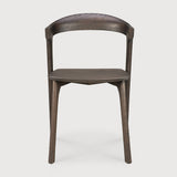 Over the years, the Bok dining chair has become one of our most recognisable designs. Designer Alain van Havre combines sculptural elegance and contemporary crafting into a graceful and airy form.

Seating height: 46cm - 18".
Made from brown tainted oak with a varnish finish. Amethyst Home provides interior design, new construction, custom furniture, and area rugs in the Seattle metro area