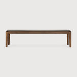 Featuring Bok Teak Brown Bench by Ethnicraft at Amethyst Home. Reminiscent of a goat's curved horns, the Bok collection combines sculptural elegance and contemporary crafting into a graceful and airy form. The Bok bench pairs well with the Bok dining table, but also as a stand-alone against a wall, in a hallway or at the end of a bed.
Overall Dimensions: 14 in W x 50 in L x 18.5. Amethyst Home provides interior design, new construction, custom furniture, and area rugs in the Los Angeles metro area