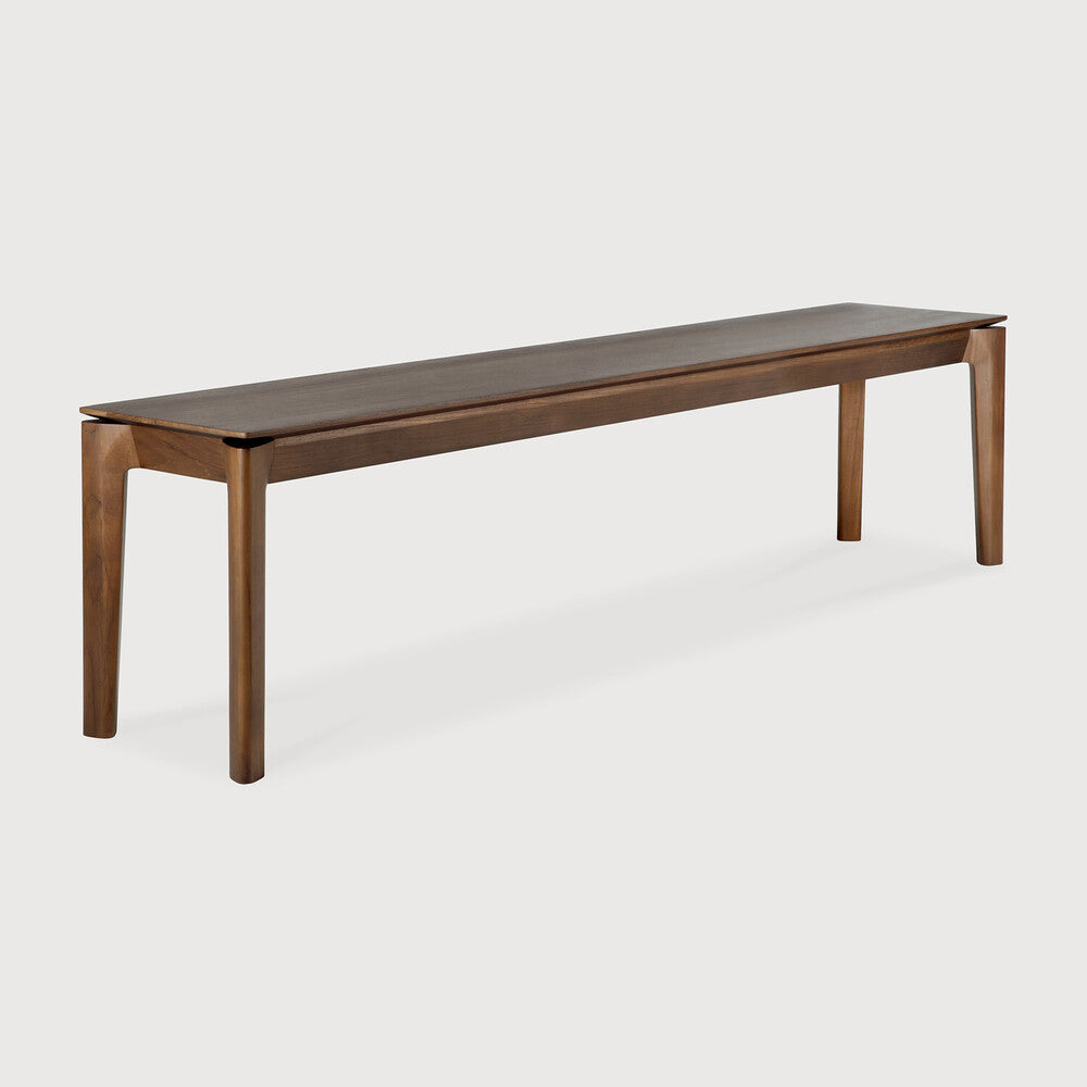 Featuring Bok Teak Brown Bench by Ethnicraft at Amethyst Home. Reminiscent of a goat's curved horns, the Bok collection combines sculptural elegance and contemporary crafting into a graceful and airy form. The Bok bench pairs well with the Bok dining table, but also as a stand-alone against a wall, in a hallway or at the end of a bed.
Overall Dimensions: 14 in W x 50 in L x 18.5 in. Amethyst Home provides interior design, new construction, custom furniture, and area rugs in the Monterey metro area