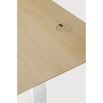 Featuring Bok White Us Oak Adjustable Desk by Ethnicraft at Amethyst Home. The Bok adjustable desk was designed with the importance of health and good posture in mind. The motorised system in its legs allows the tabletop to be elevated to the height of your liking. That way, you can easily switch between sitting and standing throughout the workday. Choose between white or black meta. Amethyst Home provides interior design, new construction, custom furniture, and area rugs in the Seattle metro area
