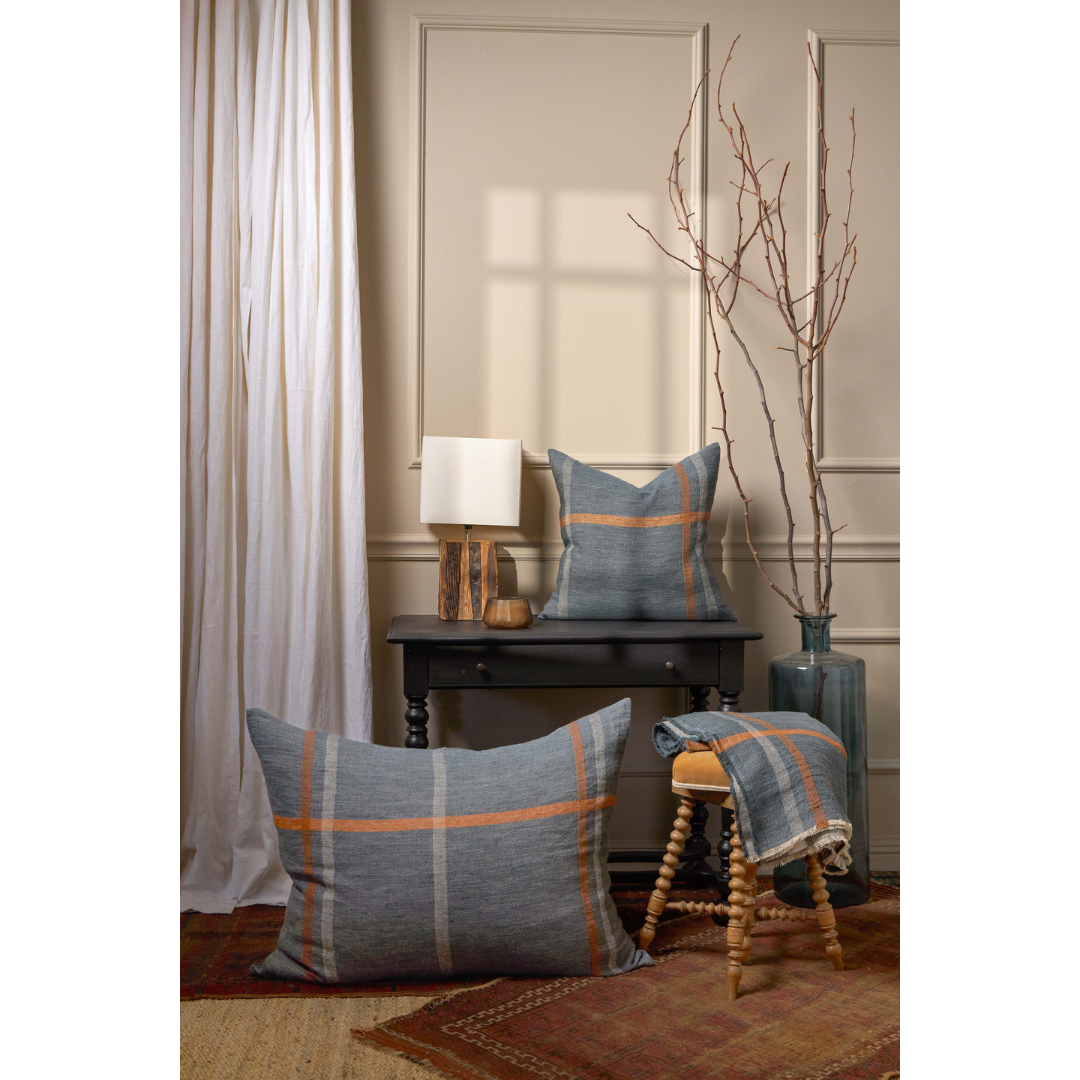 <p>Classically bold. A new hero on our block, Bryant’s oversized plaid brings a spirited heritage to our classic hand-loomed linen weave. Dark marine tones contrast with terra-cotta and ivory for a dignity not all bedding can claim. Bryant’s style statement continues with the Big Pillow, bringing the oversized plaid pattern to our oversized king of all pillows. Amethyst Home provides interior design, new construction, custom furniture, and area rugs in the Des Moines metro area