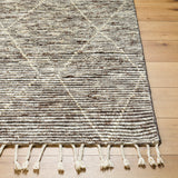 The Camille Jasper Wolf hand-knotted rug features a yummy blend of charcoal greys and chocolate brown.  Soft to the touch and made of dreamy, knotted wool in a low shed blend. Amethyst Home provides interior design, new home construction design consulting, vintage area rugs, and lighting in the Calabasas metro area.