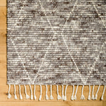 Featuring Camille Jasper Wolf Hand-Knotted Rug by Surya at Amethyst Home. The Camille Jasper Wolf hand-knotted rug features a yummy blend of charcoal greys and chocolate brown.  Soft to the touch and made of dreamy, knotted wool in a low shed blend.
Hand-Knotted100% WoolFringe Length: 5"Rug Thickness: 0.75". Amethyst Home provides interior design, new home construction design consulting, vintage area rugs, and lighting in the Winter Garden, Florida metro area.