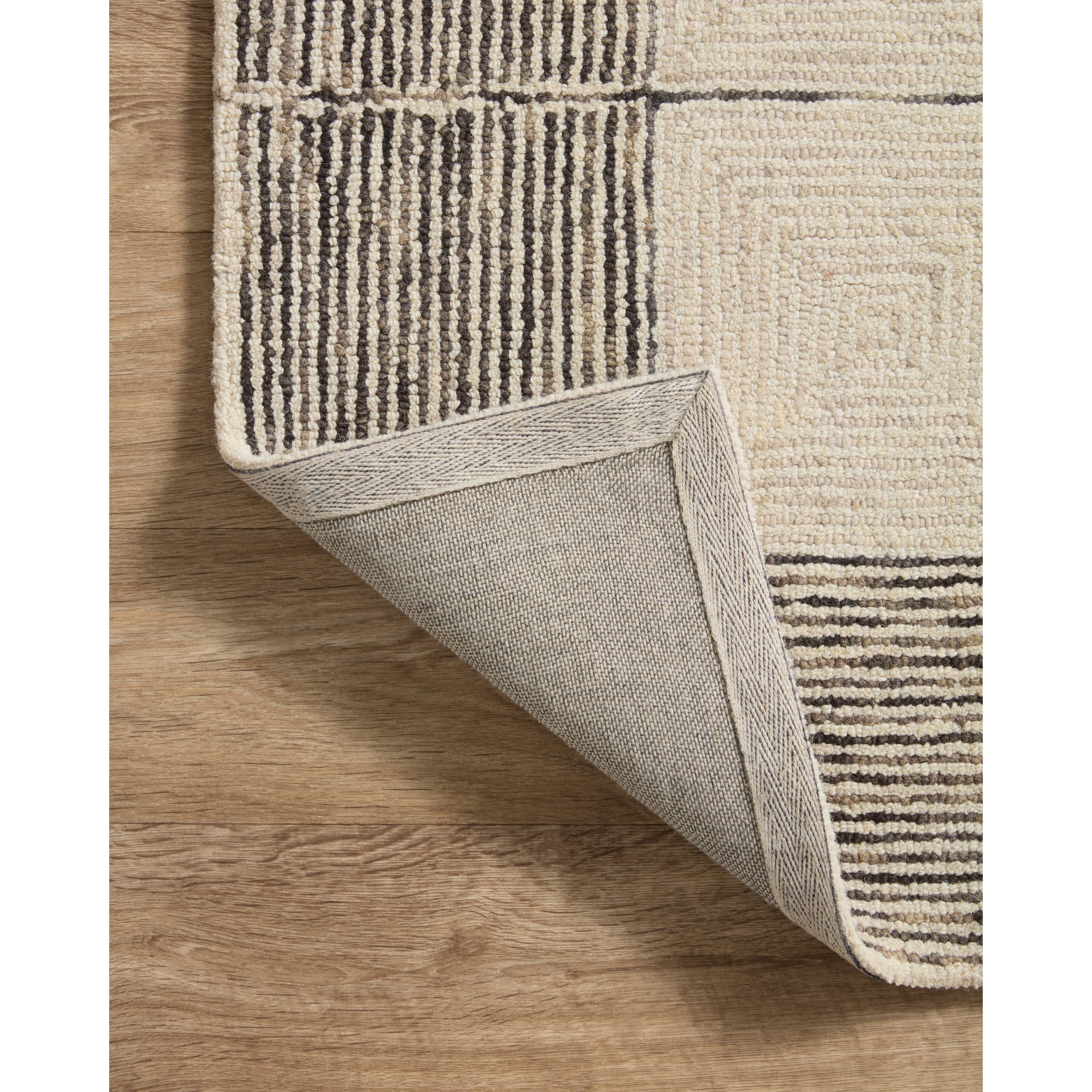Featuring Chris Loves Julia x Loloi Francis Cream / Black Runner by Loloi at Amethyst Home. The unboring neutral. Picture perfect — we love the way this rug frames your furnishings.
It’s no coincidence that the pattern of the Francis Cream / Black rug for Chris Loves Julia x Loloi may remind you of tilework—it’s based on favorite flooring patterns of the couple, from tilework to parquet floor. Amethyst Home provides interior design services, furniture, rugs, and lighting in the Seattle metro area.