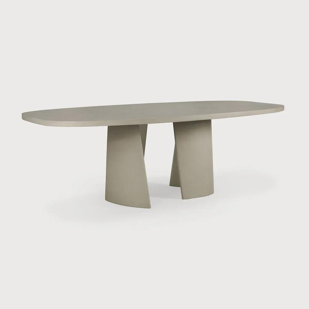 The Canyon masterfully captures the essence of fluid movement into a solid form. Mirroring the natural flow and balance of a canyon, this dining table features legs positioned to interact dynamically, creating a corresponding yet intriguing balance. Amethyst Home provides interior design, new home construction design consulting, vintage area rugs, and lighting in the Charlotte metro area.