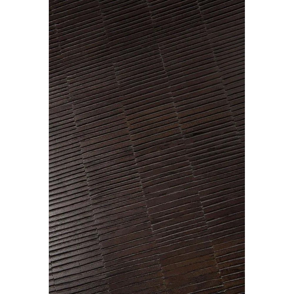 The Grooves coffee table brings a soulful element to a room. Every single line is hand carved, making each piece truly unique. Small imperfections are part of the story; even more so, they enhance Grooves' character. The result is a slightly different surface every time, each with its own rhythm and dynamics. Amethyst Home provides interior design, new home construction design consulting, vintage area rugs, and lighting in the Houston metro area.