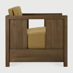 The Roan lounge chair is based on a 1930s original by Paul Poiret, reinterpreted in a form that feels steady and composed. A solid wooden frame surrounds a generous seat, creating a compact chair with a grounded stance. Defined by clean lines and structured arms, Roan offers comfort without excess. Amethyst Home provides interior design, new home construction design consulting, vintage area rugs, and lighting in the Boston metro area.