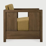 The Roan lounge chair is based on a 1930s original by Paul Poiret, reinterpreted in a form that feels steady and composed. A solid wooden frame surrounds a generous seat, creating a compact chair with a grounded stance. Defined by clean lines and structured arms, Roan offers comfort without excess. Amethyst Home provides interior design, new home construction design consulting, vintage area rugs, and lighting in the Boston metro area.