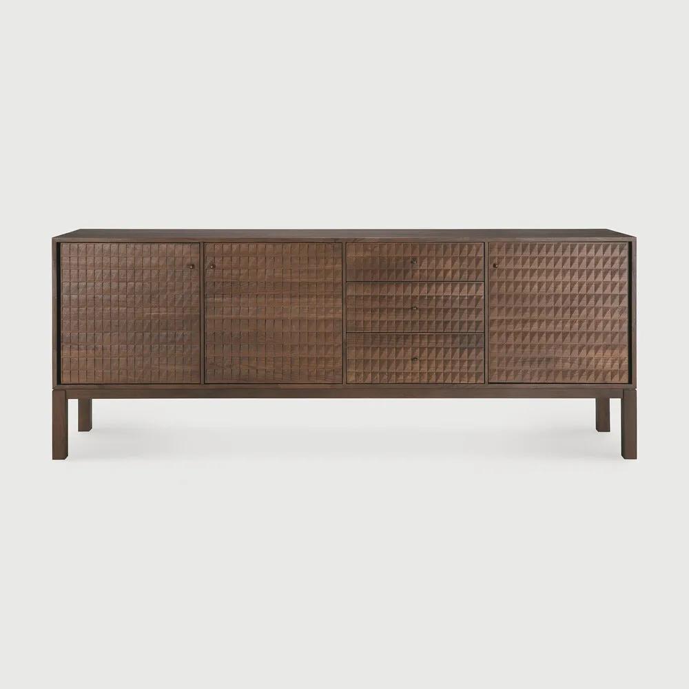 Sono, where antique-inspired craftsmanship meets modern elegance. This refined statement collection features hand-carved panels, offering functional storage behind classic beauty. Delicate casted brass handles elevate its look, making for a stunning addition to a room. Amethyst Home provides interior design, new home construction design consulting, vintage area rugs, and lighting in the Austin metro area.