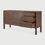 Sono, where antique-inspired craftsmanship meets modern elegance. This refined statement collection features hand-carved panels, offering functional storage behind classic beauty. Delicate casted brass handles elevate its look, making for a stunning addition to a room. Amethyst Home provides interior design, new home construction design consulting, vintage area rugs, and lighting in the Boston metro area.