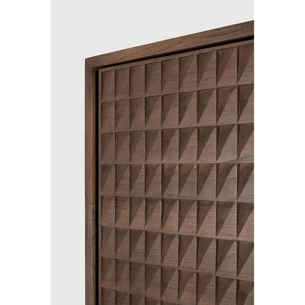 Sono, where antique-inspired craftsmanship meets modern elegance. This refined statement collection features hand-carved panels, offering functional storage behind classic beauty. Delicate casted brass handles elevate its look, making for a stunning addition to a room. Amethyst Home provides interior design, new home construction design consulting, vintage area rugs, and lighting in the Omaha metro area.