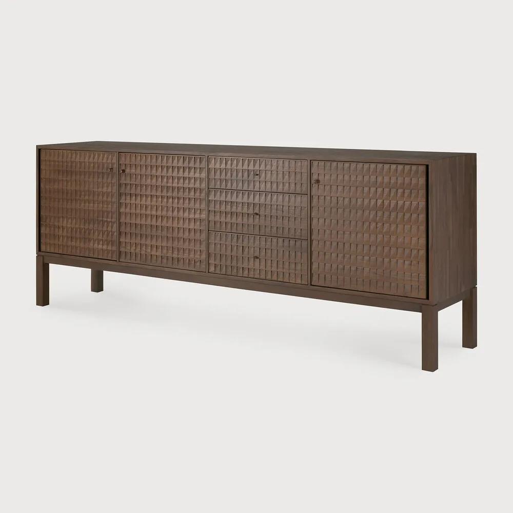 Sono, where antique-inspired craftsmanship meets modern elegance. This refined statement collection features hand-carved panels, offering functional storage behind classic beauty. Delicate casted brass handles elevate its look, making for a stunning addition to a room. Amethyst Home provides interior design, new home construction design consulting, vintage area rugs, and lighting in the Salt Lake City metro area.