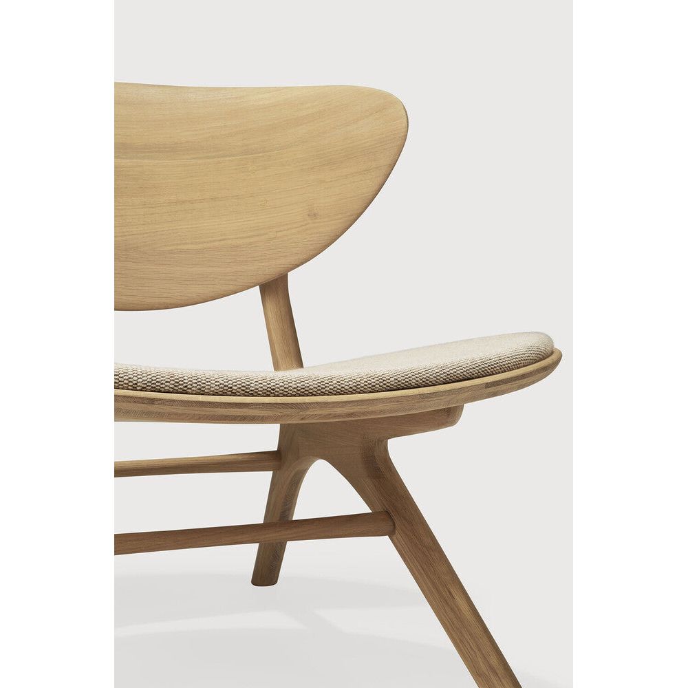 Beauty is in the eye of the beholder. With sleek, angular, front legs and flowing smooth connections, the Eye lounge chair is a hallmark solid wooden seating design. The curved backrest, reminiscent of a winked eye, inspired the name of the chair. Think subtle elegance with a stylish edge.Weight : 51 lb Dimensions: 30.5 in W x 32.5 in L x 32. Amethyst Home provides interior design, new construction, custom furniture, and area rugs in the Nashville metro area