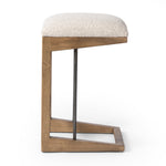 'A stunner from every angle, this architecturally inspired counter stool features an angular base crafted from solid ash with two iron rods for added support and visual interest. Seat is upholstered in a linen/cotton/poly blend performance fabric with subtle texture throughout. Amethyst Home provides interior design, new construction, custom furniture, and area rugs in the Des Moines metro area