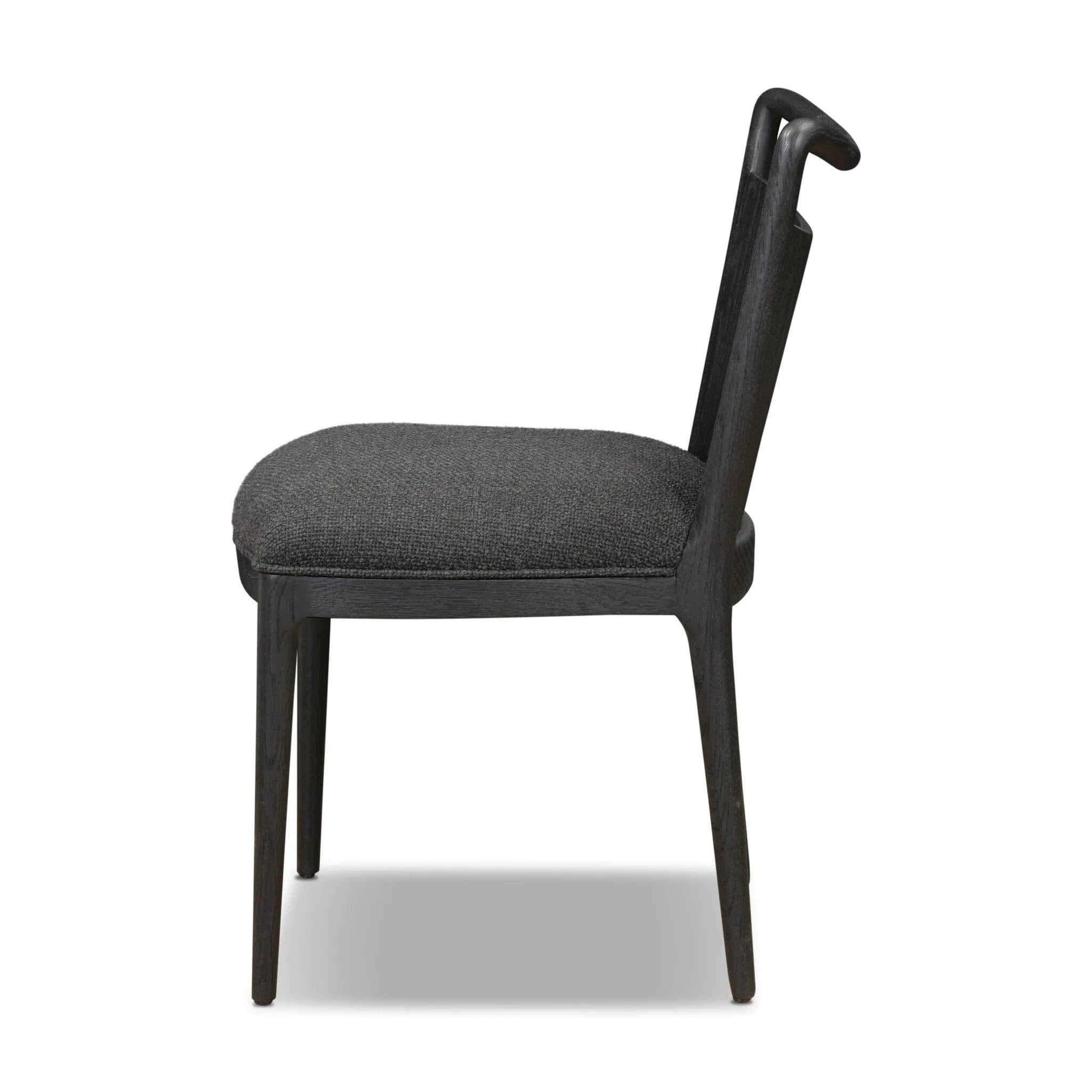 As enthusiasts of modern style at Amethyst, we love the warm modern inspired Jessen Dining Chair - Gibson Black. This item pairs well with other brands such as Surya and is perfect for eclectic homes Amethyst Home provides interior design, new home construction design consulting, vintage area rugs, and lighting in the Salt Lake City metro area.