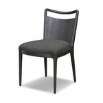 As enthusiasts of modern style at Amethyst, we love the warm modern inspired Jessen Dining Chair - Gibson Black. This item pairs well with other brands such as Surya and is perfect for eclectic homes Amethyst Home provides interior design, new home construction design consulting, vintage area rugs, and lighting in the Scottsdale metro area.