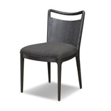 As enthusiasts of modern style at Amethyst, we love the warm modern inspired Jessen Dining Chair - Gibson Black. This item pairs well with other brands such as Surya and is perfect for eclectic homes Amethyst Home provides interior design, new home construction design consulting, vintage area rugs, and lighting in the Scottsdale metro area.