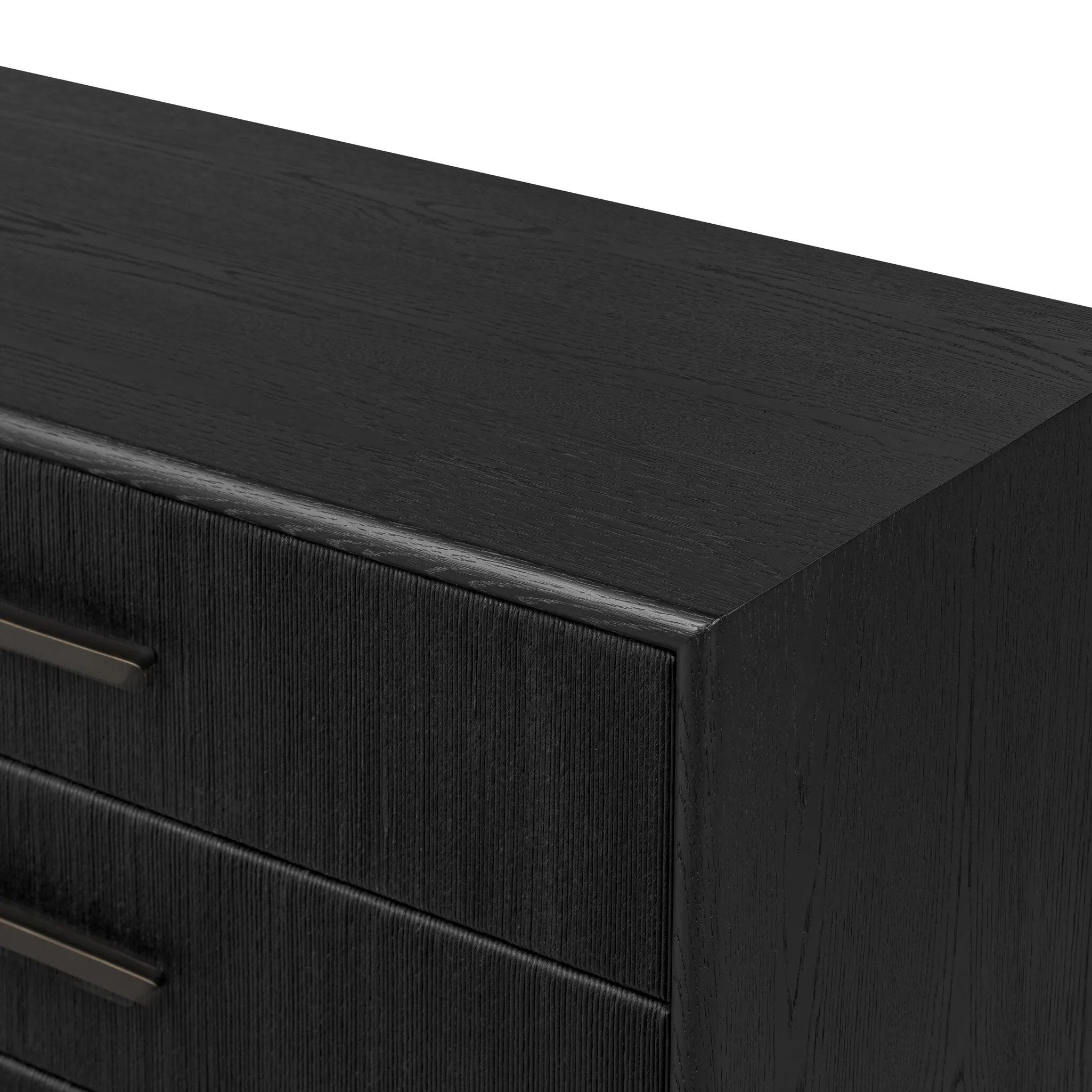 As fans of modern materials at Amethyst, we love the optimistic inspired Rosenell 6 Drawer Dresser - Black Paper Cord. This item pairs well with other brands such as Four Hands and is perfect for loft homes Amethyst Home provides interior design, new home construction design consulting, vintage area rugs, and lighting in the Laguna Beach metro area.