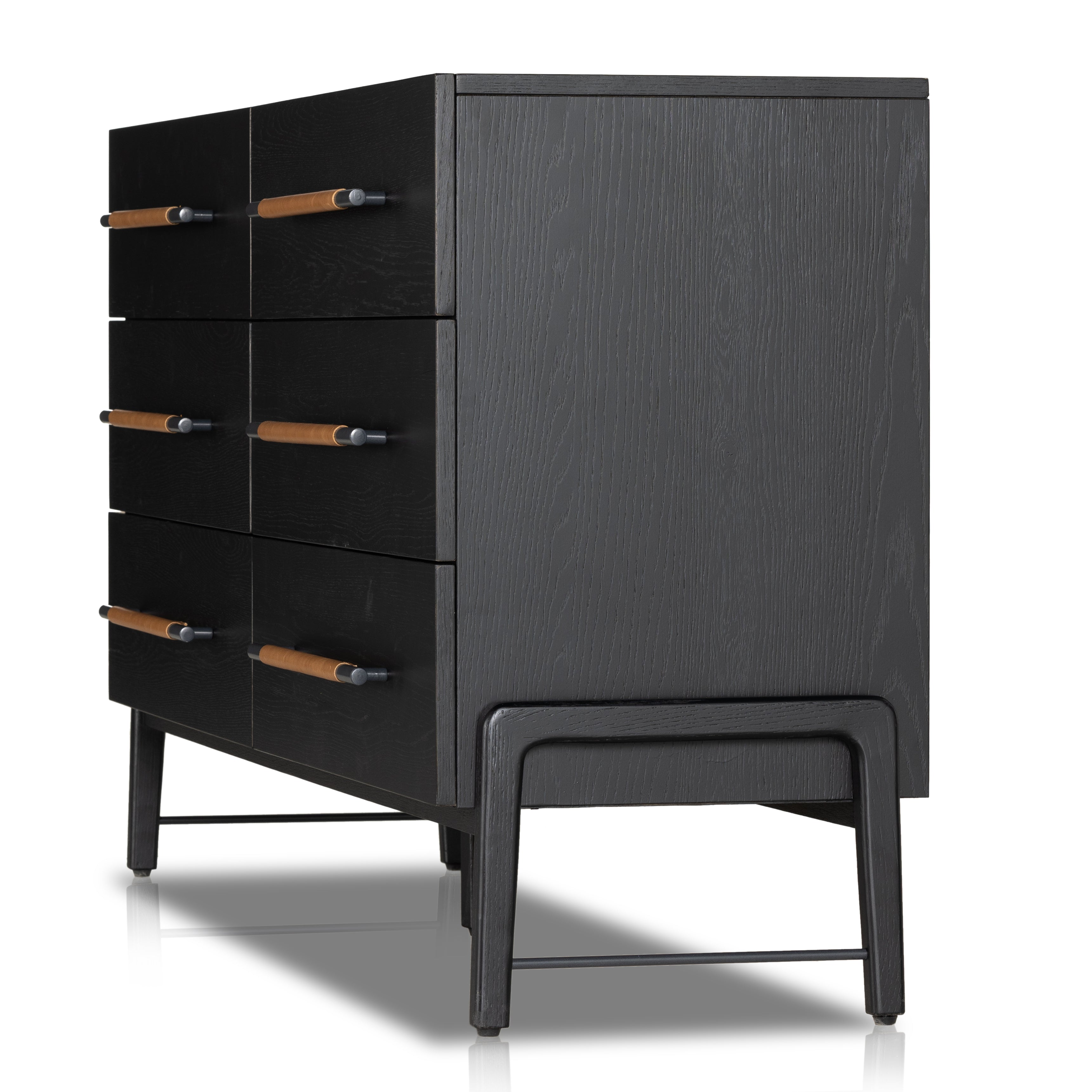The ebony oak of this Rosedale 6 Drawer Dresser brings a moody, darkness to any room. With six spacious drawers and iron hardware wrapped in a gorgeous, tan leather, this is a functional and beautiful piece to add to your bedroom or other area.  Amethyst Home provides interior design, new home construction design consulting, vintage area rugs, and lighting in the Portland metro area.