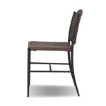 A bistro-style outdoor dining chair, merging a timeless profile with a unique stripe detail woven into the back. Finial details finish the dark bronze frame. Cover or store indoors during inclement weather and when not in use.As enthusiasts of luxe style at Amethyst, we love the nature inspired Abel Outdoor Dining Chair. Amethyst Home provides interior design, new home construction design consulting, vintage area rugs, and lighting in the Tampa metro area.