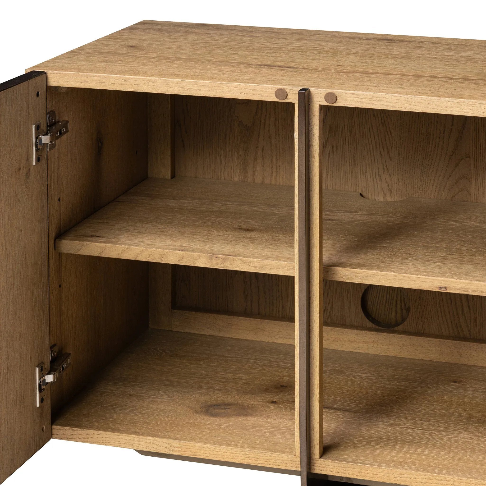 Designed around the piece’s slim metal legs, this media console combines aged brass-finished iron and aged smoked oak veneer for a sleek, modern look. Shelving and drawers provide ample room for your living or media space essentials. Rear cutouts for cord management. Amethyst Home provides interior design, new home construction design consulting, vintage area rugs, and lighting in the Park City metro area.