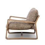 The perfect place to curl up with a good book. A hand-shaped parawood frame supports low, deep seating upholstered with taupe shearling Amethyst Home provides interior design, new home construction design consulting, vintage area rugs, and lighting in the Scottsdale metro area.