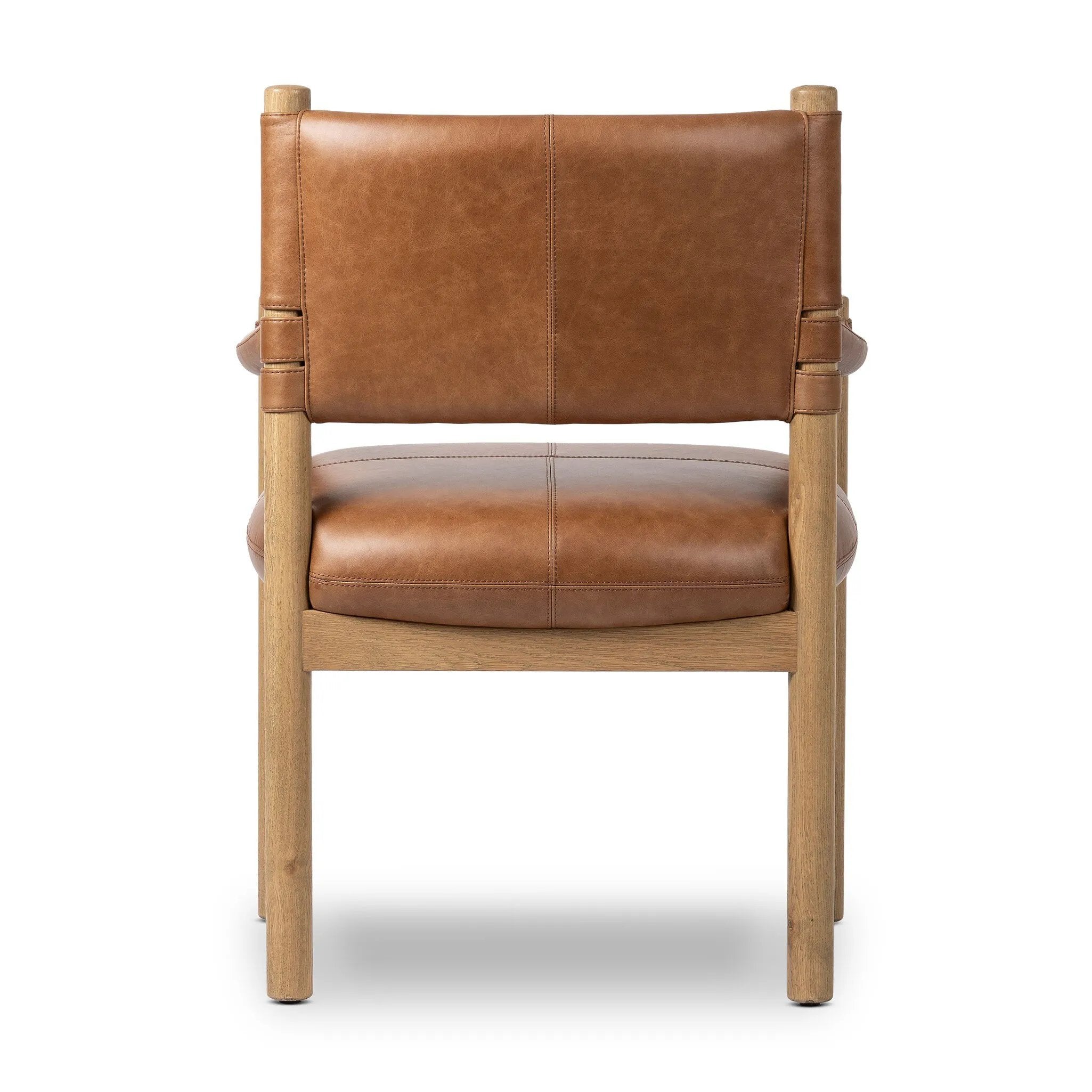 Featuring Adaline Sonoma Chestnut Dining Armchair by Four Hands at Amethyst Home. Elevate your dining space with a mixed-material seat inspired by Nordic minimalism. Plush cushioning upholstered in exclusive top-grain leather add volume, while a natural oak frame lightens the whole look. Overall Dimensions: 25.00"w x 23.50"d x 35.00"h. Amethyst Home provides interior design, new home construction design consulting, vintage area rugs, and lighting in the Calabasas metro area.