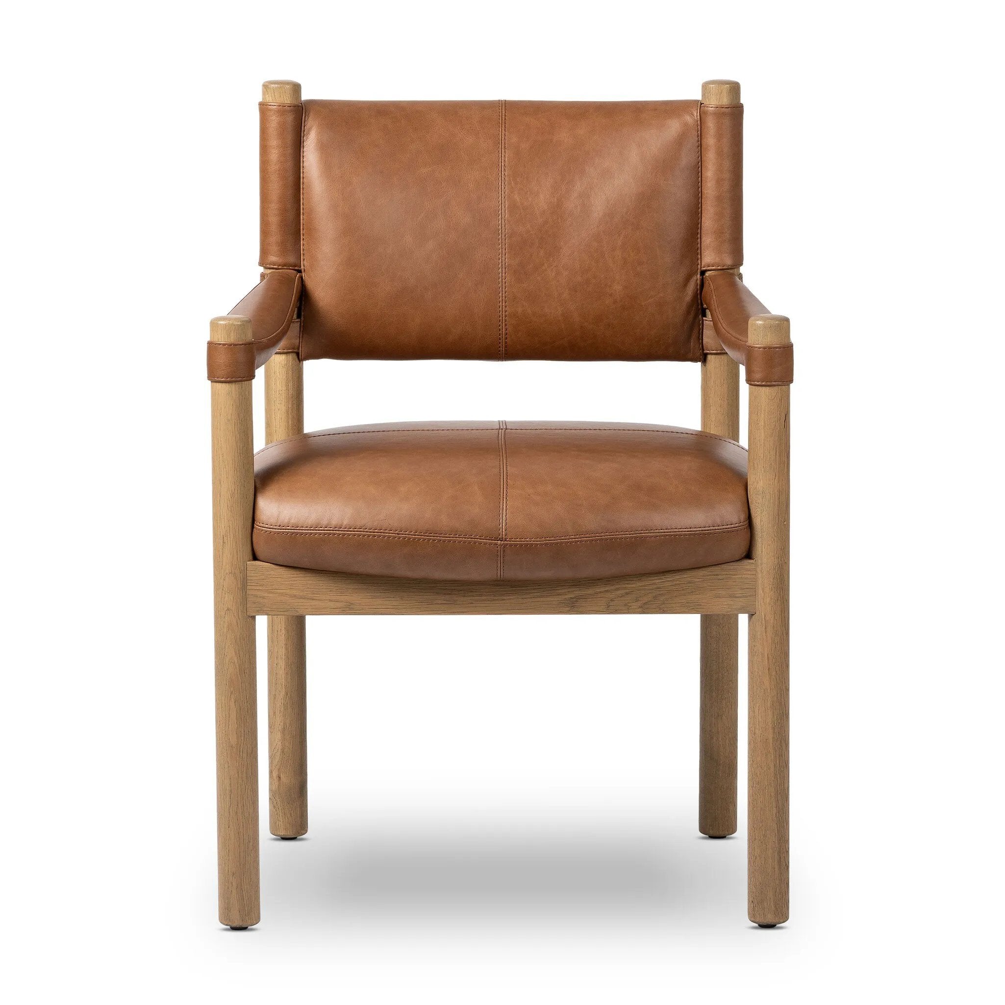 Featuring Adaline Sonoma Chestnut Dining Armchair by Four Hands at Amethyst Home. Elevate your dining space with a mixed-material seat inspired by Nordic minimalism. Plush cushioning upholstered in exclusive top-grain leather add volume, while a natural oak frame lightens the whole look. Overall Dimensions: 25.00"w x 23.50"d x 35.00"h. Amethyst Home provides interior design, new home construction design consulting, vintage area rugs, and lighting in the Tampa metro area.