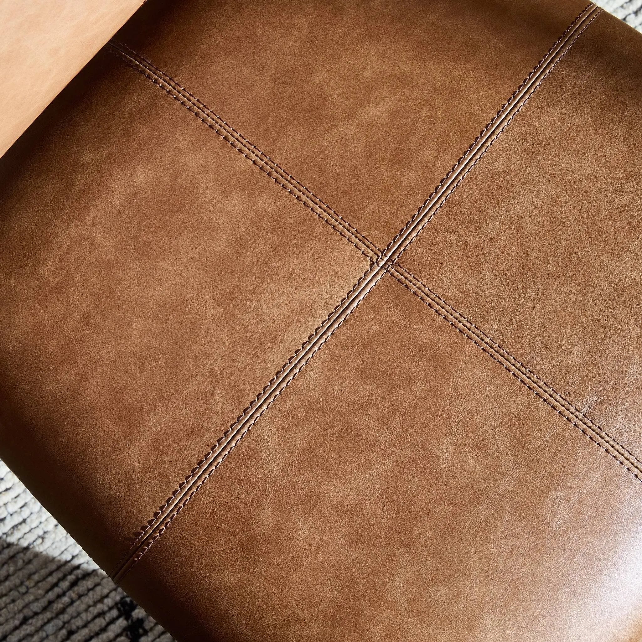 Featuring Adaline Sonoma Chestnut Dining Chair by Four Hands at Amethyst Home. Elevate your dining space with a mixed-material seat inspired by Nordic minimalism. Plush cushions of exclusive top-grain leather craft comfort and volume, all framed out by natural oak. Overall Dimensions: 21.00"w x 23.50"d x 35.00"h. Amethyst Home provides interior design, new home construction design consulting, vintage area rugs, and lighting in the Dallas metro area.