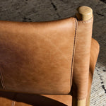Featuring Adaline Sonoma Chestnut Dining Chair by Four Hands at Amethyst Home. Elevate your dining space with a mixed-material seat inspired by Nordic minimalism. Plush cushions of exclusive top-grain leather craft comfort and volume, all framed out by natural oak. Overall Dimensions: 21.00"w x 23.50"d x 35.00"h. Amethyst Home provides interior design, new home construction design consulting, vintage area rugs, and lighting in the Omaha metro area.