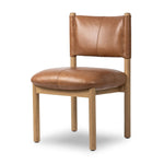 Featuring Adaline Sonoma Chestnut Dining Chair by Four Hands at Amethyst Home. Elevate your dining space with a mixed-material seat inspired by Nordic minimalism. Plush cushions of exclusive top-grain leather craft comfort and volume, all framed out by natural oak. Overall Dimensions: 21.00"w x 23.50"d x 35.00"h. Amethyst Home provides interior design, new home construction design consulting, vintage area rugs, and lighting in the Salt Lake City metro area.
