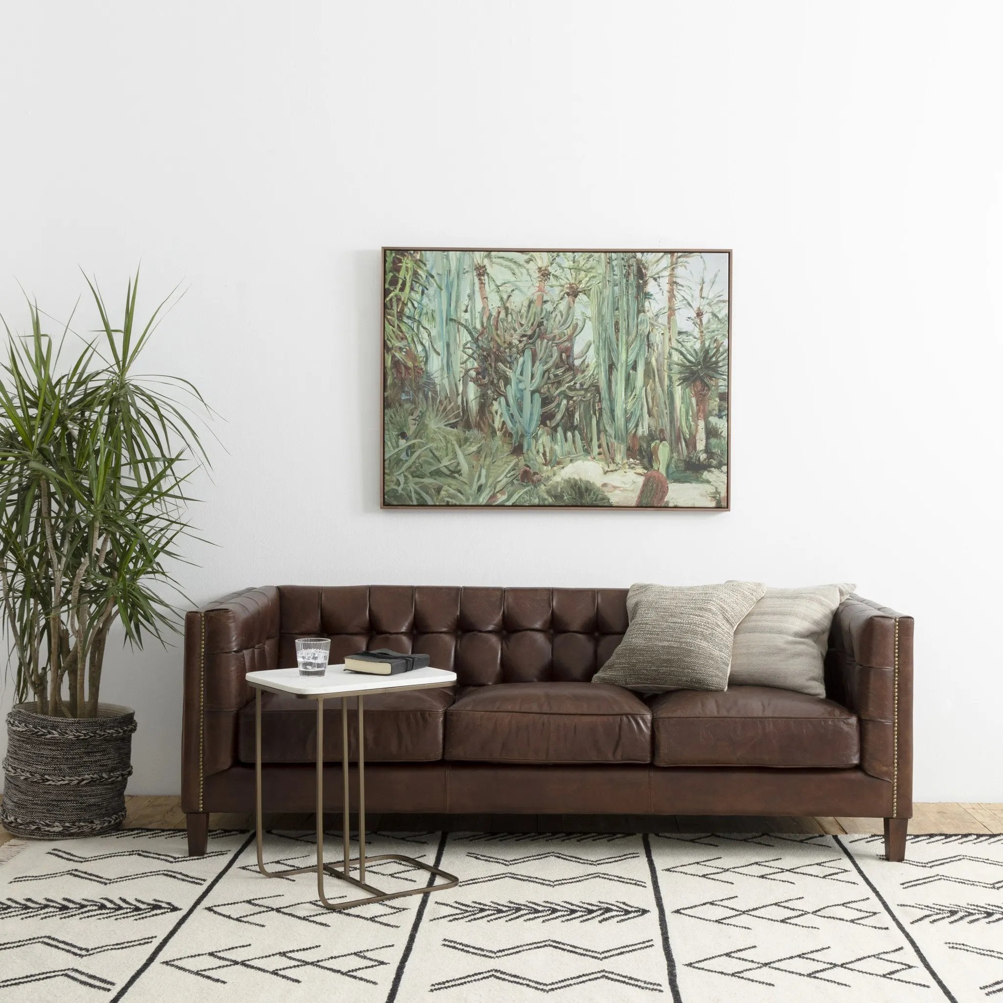 Featuring Adalley Polished White Marble C Table by Four Hands at Amethyst Home. Add a pop of marble in a classic, polished white. The matte brass C-table base slides perfectly over a sofa, adding an easy surface.Overall Dimensions: 15.00"w x 19.00"d x 23.00"hWeight : 31.42 lbsMaterials: Solid Marble, Iron. Amethyst Home provides interior design, new home construction design consulting, vintage area rugs, and lighting in the Austin metro area.