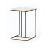 Featuring Adalley Polished White Marble C Table by Four Hands at Amethyst Home. Add a pop of marble in a classic, polished white. The matte brass C-table base slides perfectly over a sofa, adding an easy surface.Overall Dimensions: 15.00"w x 19.00"d x 23.00"hWeight : 31.42 lbsMaterials: Solid Marble, Iron. Amethyst Home provides interior design, new home construction design consulting, vintage area rugs, and lighting in the Houston metro area.