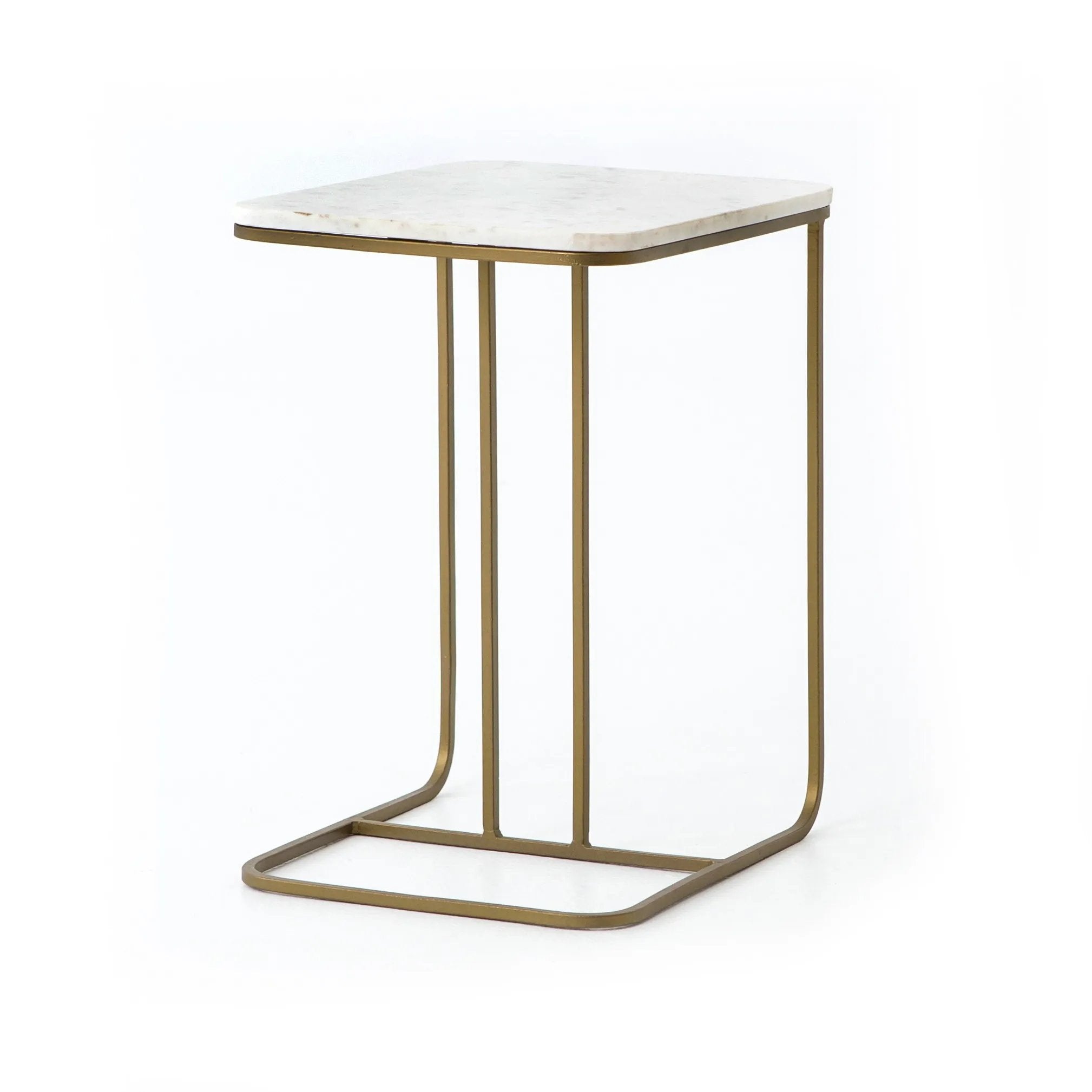 Add a pop of marble in a classic, polished white. The matte brass C-table base slides perfectly over a sofa, adding an easy surface Amethyst Home provides interior design, new home construction design consulting, vintage area rugs, and lighting in the Houston metro area.