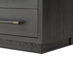 Beautifully minimalist. A three-drawer dresser made from black-finished ash  features long, linear bronzed hardware for a smooth, clean look Amethyst Home provides interior design, new home construction design consulting, vintage area rugs, and lighting in the Austin metro area.